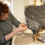 Betsy tries her hand at stitching
