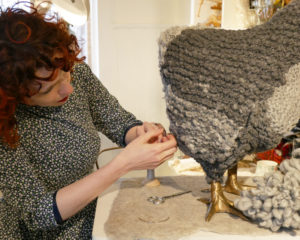 Betsy tries her hand at stitching