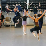 Devon demonstrates a jump during rehearsal.