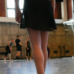 A dancer waits for her cue.