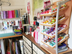 A cabinet full of Aurifil thread in Tula PInk's studio.