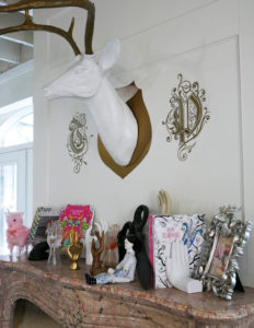The collection of curios on Tula Pink's mantlepiece.