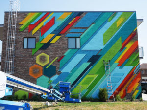 A mural in progress in downtown Kansas City.