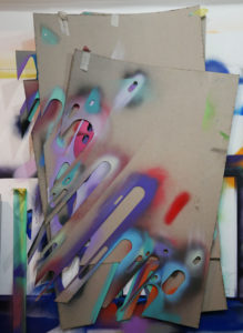 Previously used stencils piled in Phil Shafer's studio.