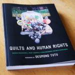 The cover of the book Quilts and Human Rights, which features an article on Nedra.