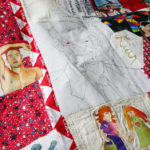 A detail of Nedra's quilt, Brownbackistan, detailing life in Kansas during Sam Brownback's term as governor.