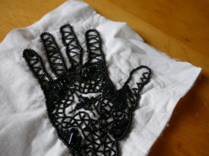 A detail from the beaded hand project that Nedra is working on.