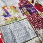 A detail of Nedra's quilt, Brownbackistan, detailing life in Kansas during Sam Brownback's term.