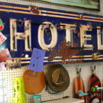A vintage neon sign hangs in artist Seth Smith's studio.