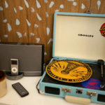 Seth's record player sits next to his iPod on his studio bookcase.