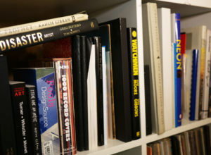 A variety of books in Seth Smith's studio library.