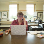 Lizzy House in her workspace. Photo by Lizzy House.
