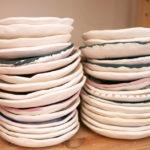 A pile of in process dishes in the Sweet Destructor studio.