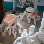 Astronaut planters await the next step in their finishing process.