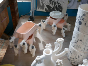 Astronaut planters await the next step in their finishing process.