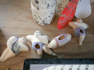 Figurine vases being glazed in Momoko's studio.