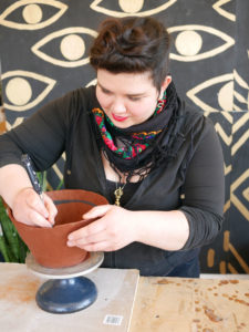 Evie Englezos of Sweet Destructor at work in her studio.